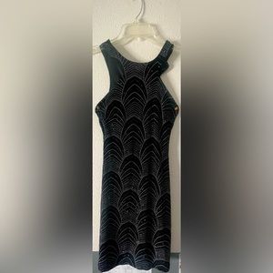 Small Black sparkly dress with a hole in the back with zippers. No flaws